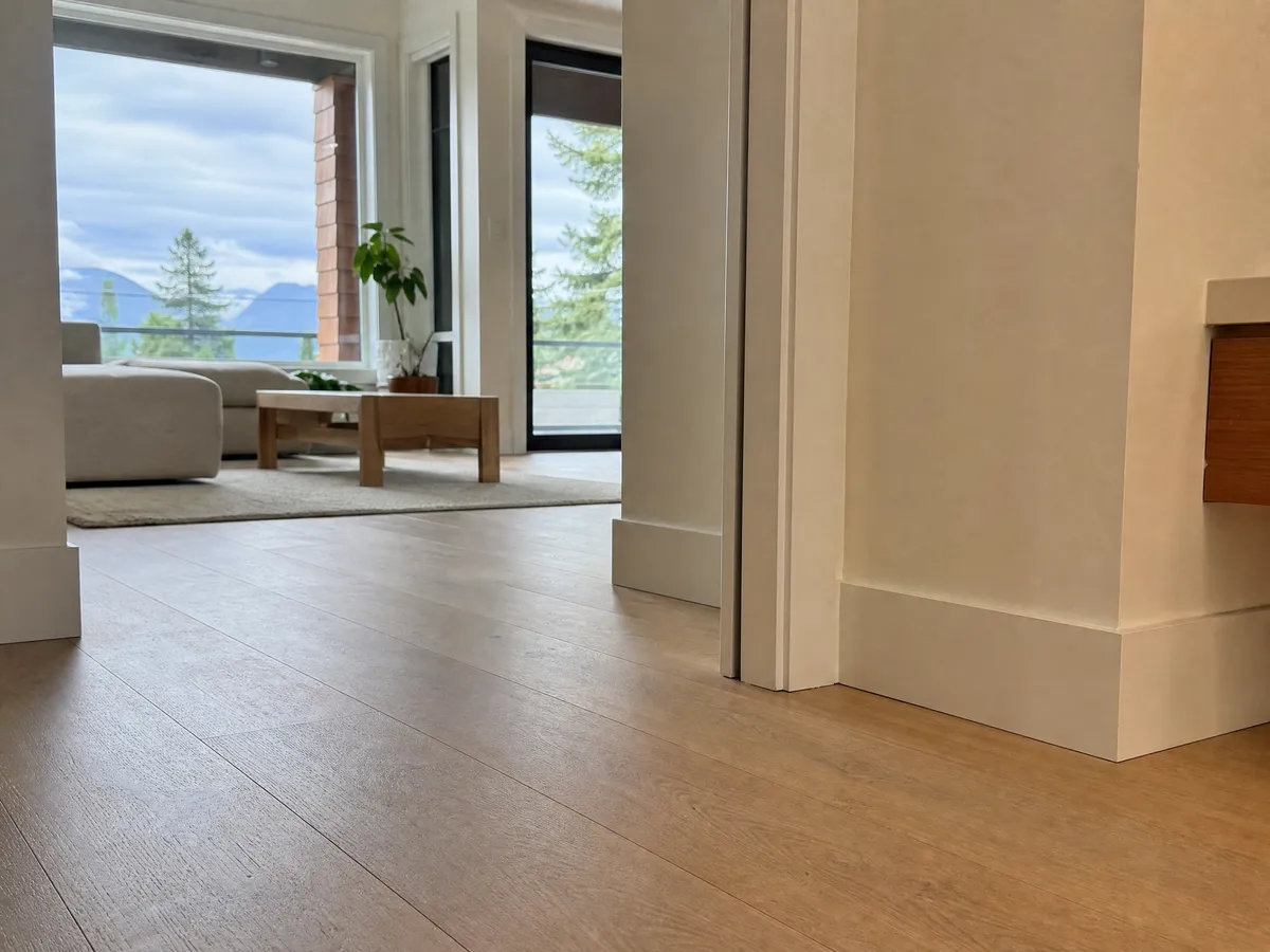 New flooring and baseboards in a North Vancouver living room